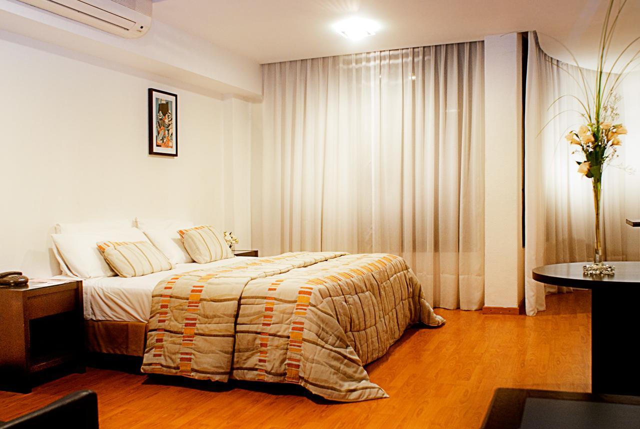 Urquiza Apart Hotel & Suites ロサリオ エクステリア 写真